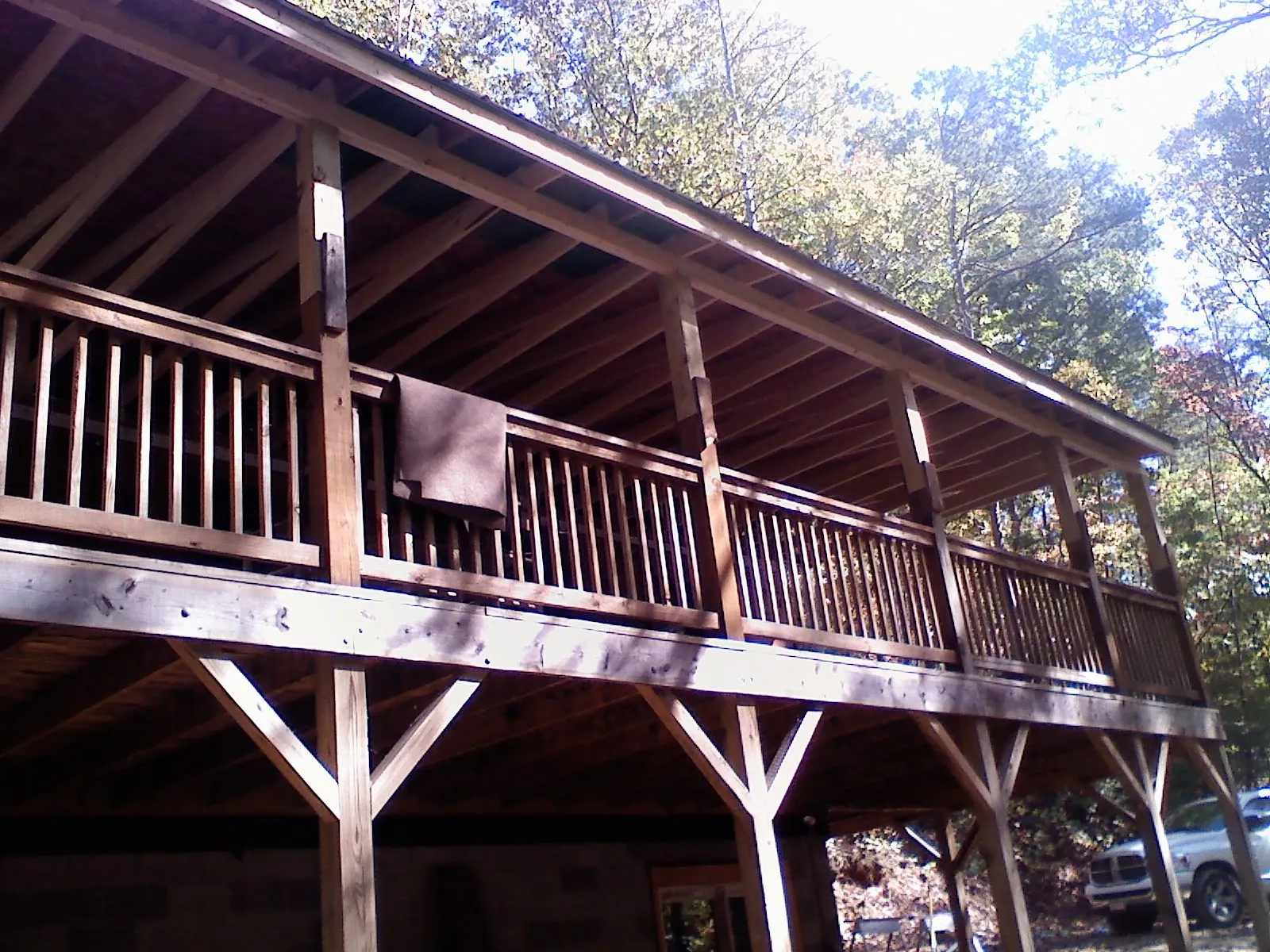 Timber framing under a new elevated porch and deck — Roof Leak Repair in Bahama by Roofing Brothers